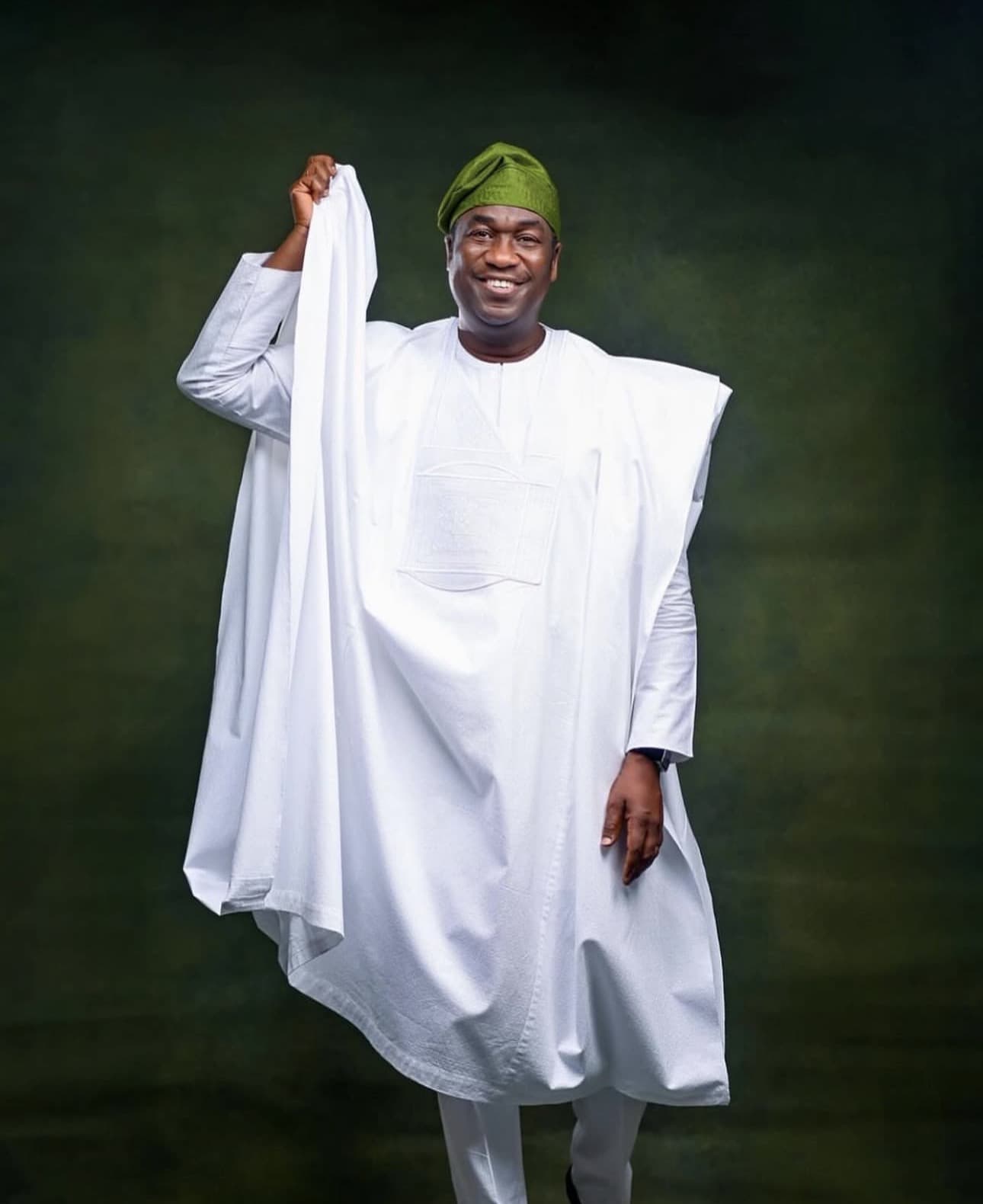 KOH in white agbada — celebrating with Lagos